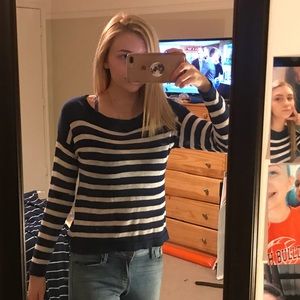 blue and white stripped divided sweater